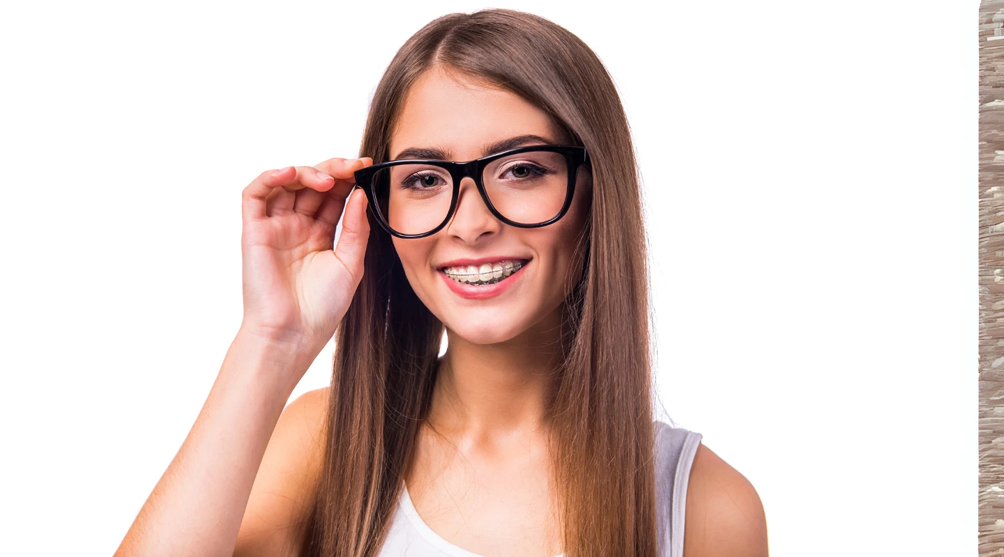 a girl with clear braces