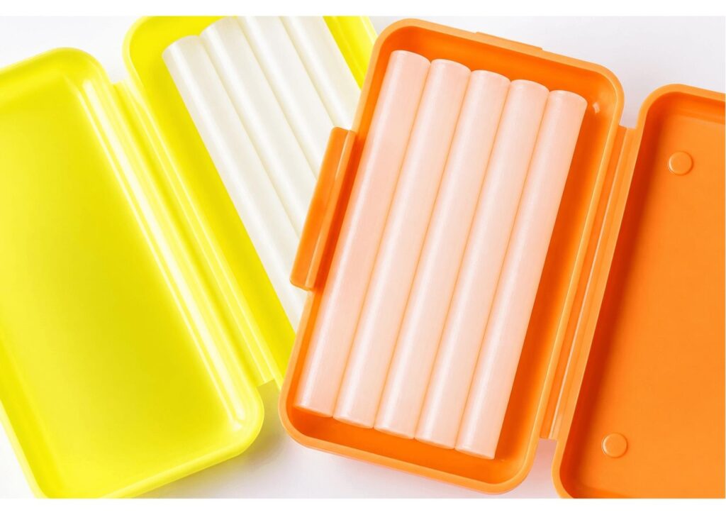 Orthodontic wax sticks in a plastic case used to reduce braces irritation and protect cheeks and lips.